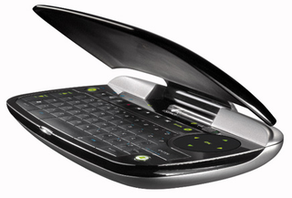 Illustration for article titled Logitech DiNovo Mini Wireless Keyboard Controls Windows Media Center and PS3